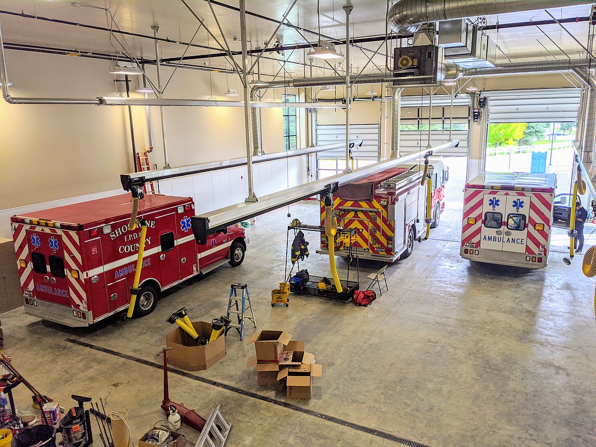 A view of the 4,800-square-foot apparatus bay from the second story. A reinforced doorway allows crews to conduct ladder and rope climbing drills indoors. The new bay provides plenty of room for multiple vehicles and crews to comfortably gear up for calls.