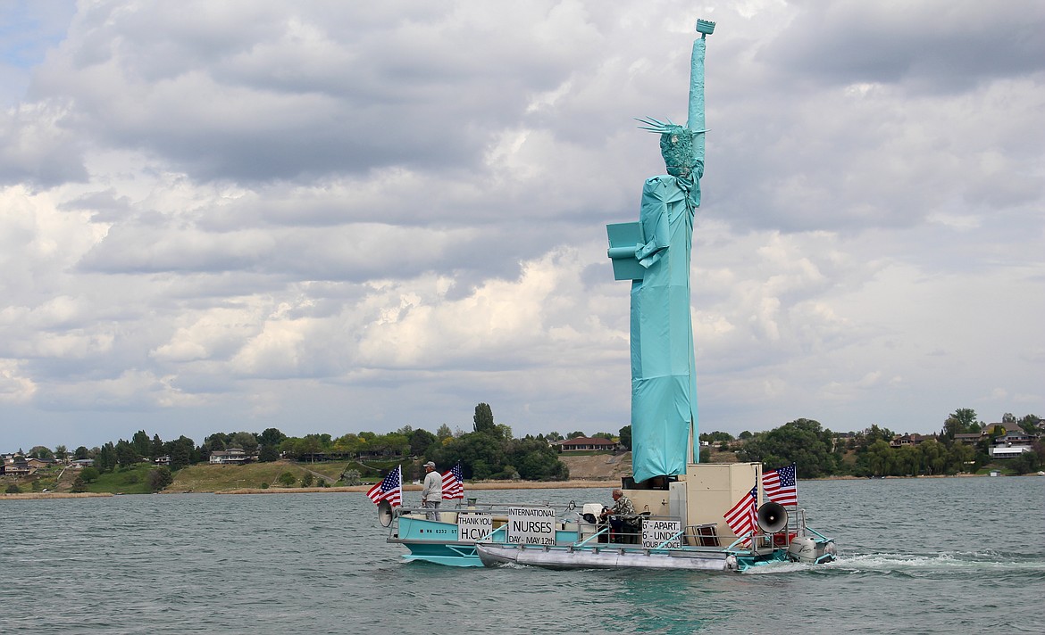 Casey McCarthy/Columbia Basin Herald
A staple of the annual Boat Parade, Mick Hansen’s Statue of Liberty made an early appearance this year to honor nurses and health care workers.