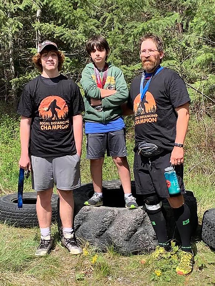 From left, are Plains Spartan Race competitors Will Tatum, Greg Tatum and their dad, Mike Tatum. Mike was prepared to compete in the Montana Spartan Challenge in Bigfork before COVID-19 put a halt to it. So he built a course near home and the tradition continued. (Photo by Shawna Tatum)