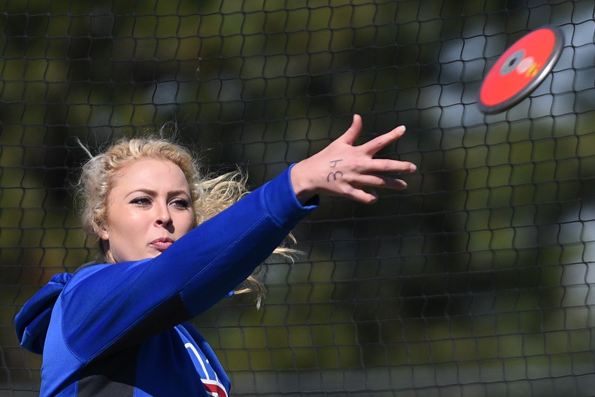 Bigfork's Jaime Berg competes in the girls discus at the Bigfork Invitational track and field meet on Saturday. (Casey Kreider/Daily Inter Lake)