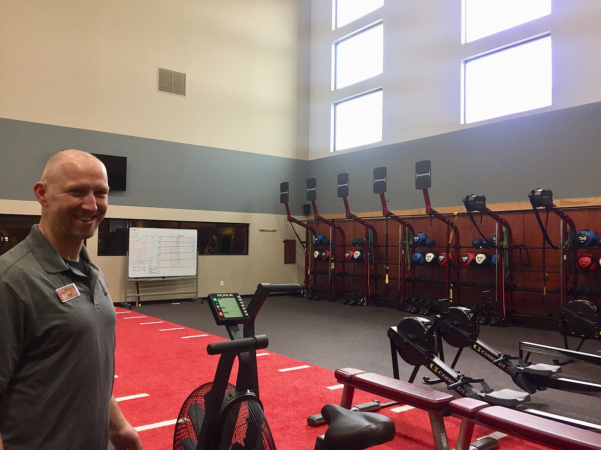 PEAK Health & Wellness Center Fitness Director Bryan Janzen explains how he prepared for socially distanced "Move-tribe" classes. The workout, similar to a cross-fit experience, was slightly modified to keep athletes safe. (JENNIFER PASSARO/Press)