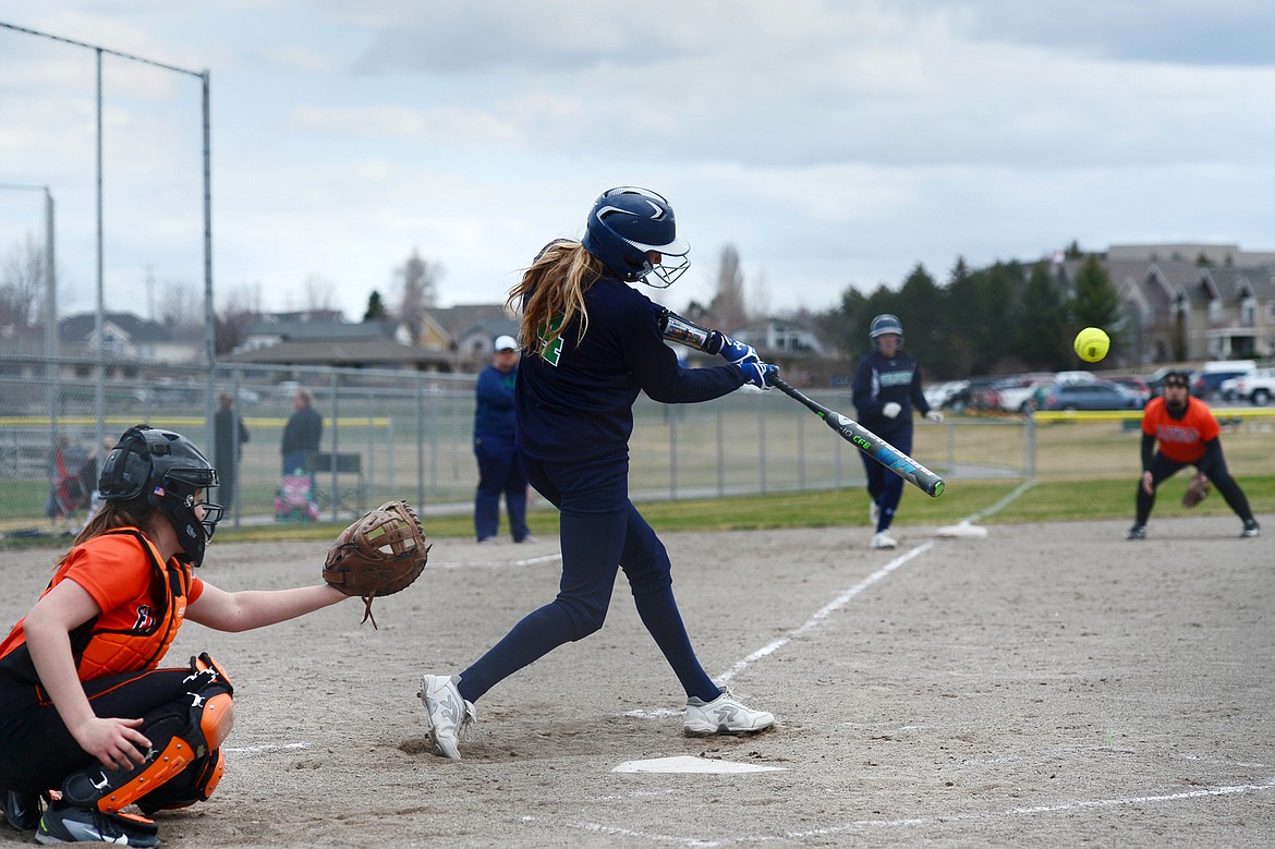 Glacier's Sophie Smith rips an RBI single in the second game of a doubleheader against Flathead at Kidsports Complex on Tuesday, April 16, 2019. (Casey Kreider/Daily Inter Lake)