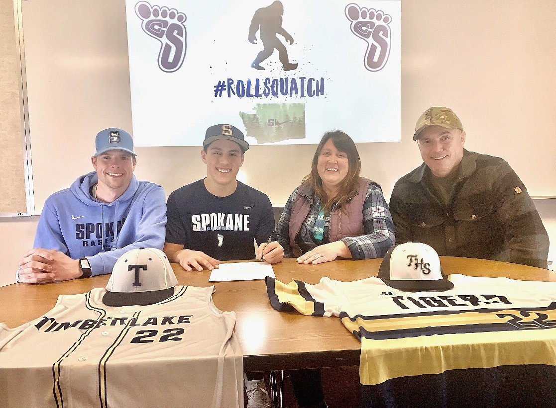 Timberlake senior Jack McDonald recently signed a letter of intent to play baseball at Community Colleges of Spokane. From left are Bryce Johnson (Timberlake High assistant baseball coach), Jack McDonald, Carey McDonald (mom) and Rob McDonald (dad).