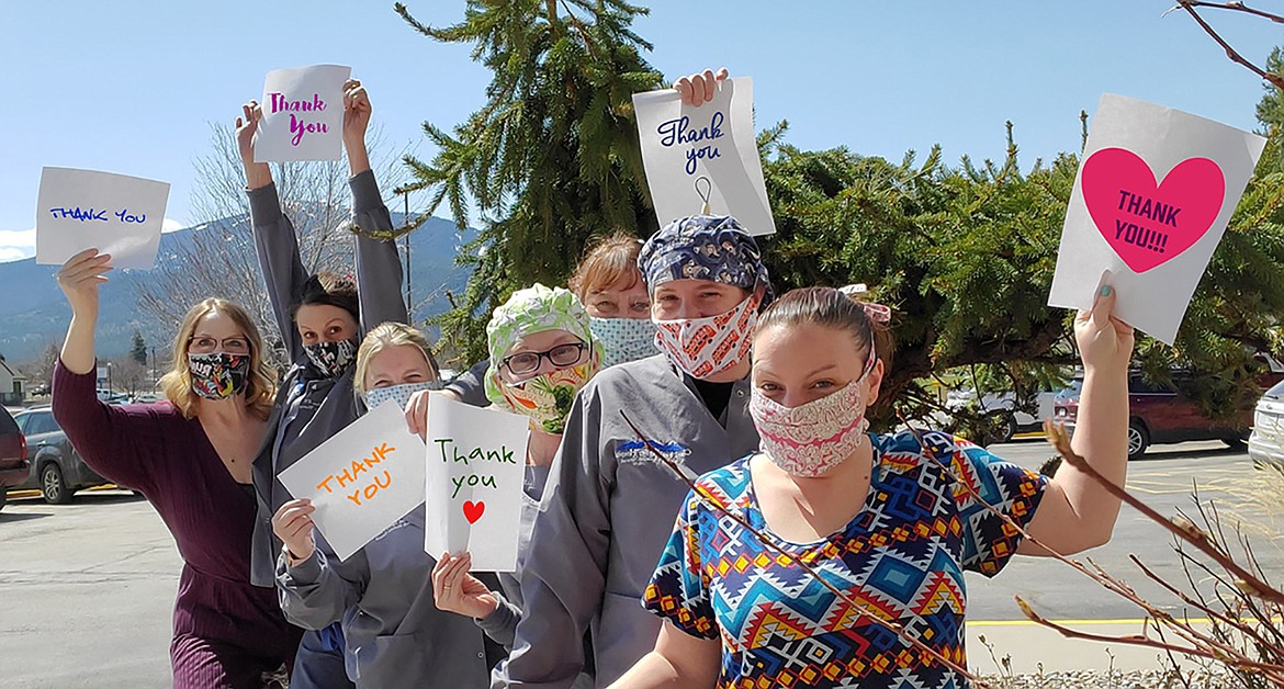 Staff members at Clark Fork Valley Hospital show their appreciation to those who sewed gowns and masks. (Photo courtesy Clark Fork Valley Hospital Facebook page)