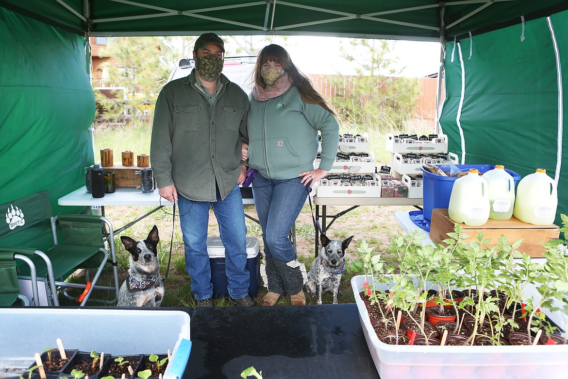 Brent and Tomi Todaro of Paramount Trading Company man their booth on May 13 in Bigfork.