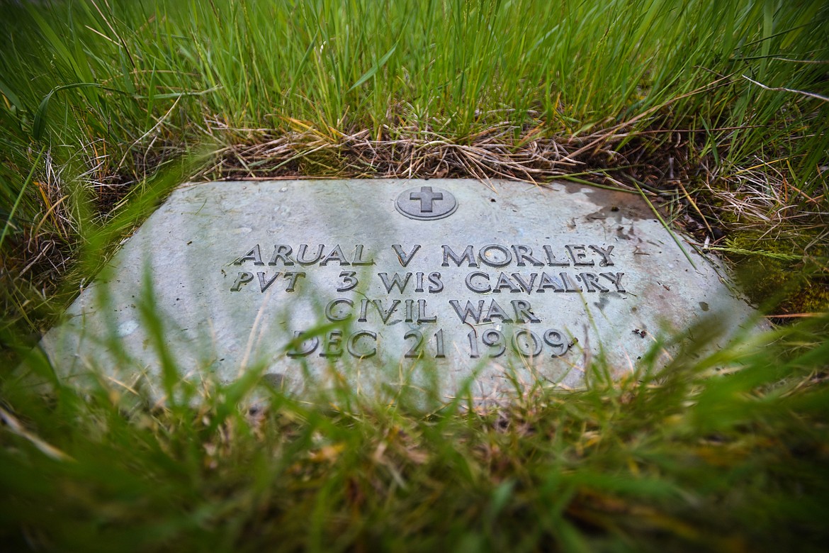 The gravestone of Arual V. Morley, a U.S. Army veteran of the Civil War, at Lone Pine Cemetery in Bigfork on Friday, May 15. (Casey Kreider/Daily Inter Lake)