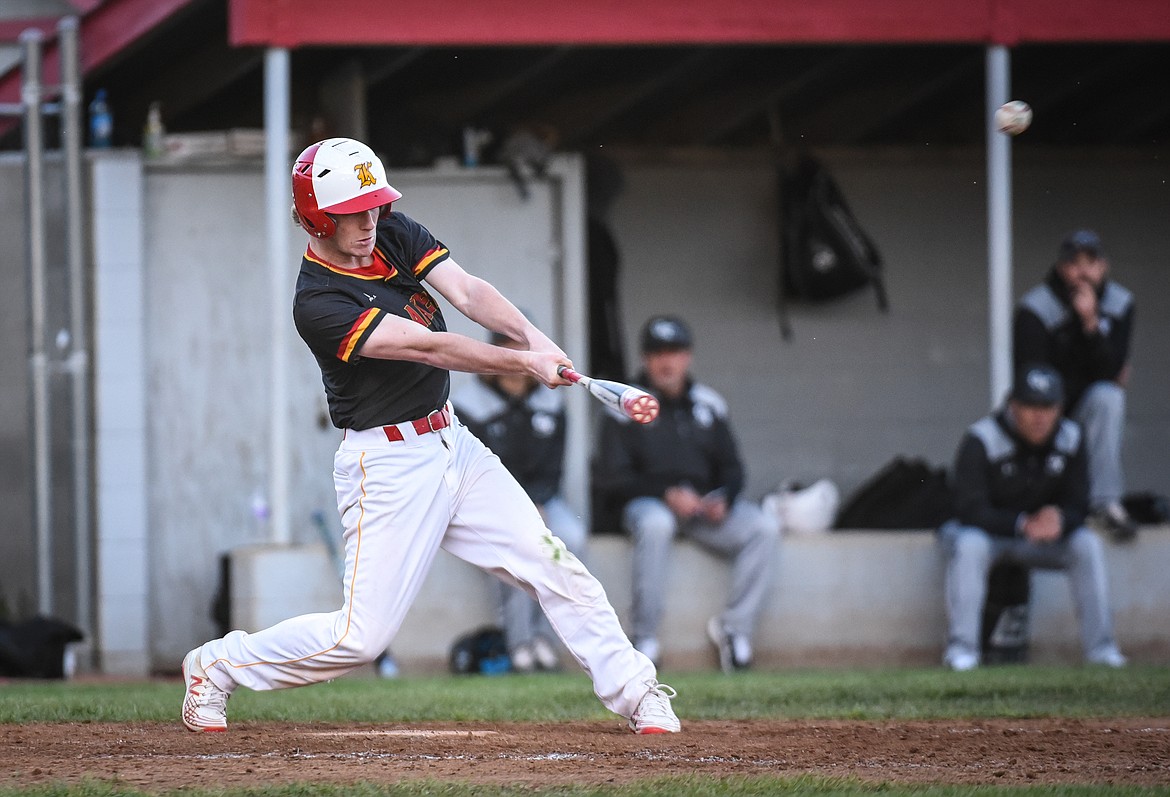 Kalispell Lakers AA’s Ben Corriveau connects on an RBI triple in the bottom of the fifth inning against the Glacier Twins A at Griffin Field on Saturday. (Casey Kreider/Daily Inter Lake)