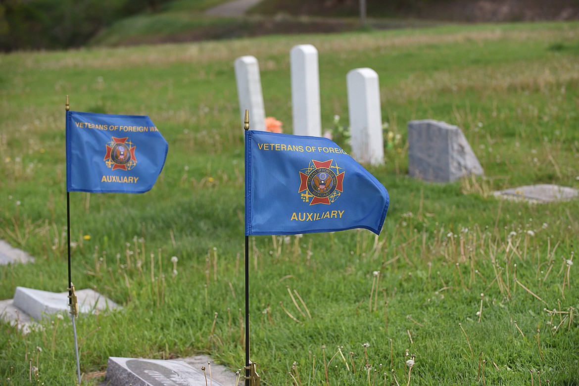 Members of the Plains VFW 3596 Auxiliary have been planting flags since 1938 when the chapter received its charter. (Scott Shindledecker/Valley Press)