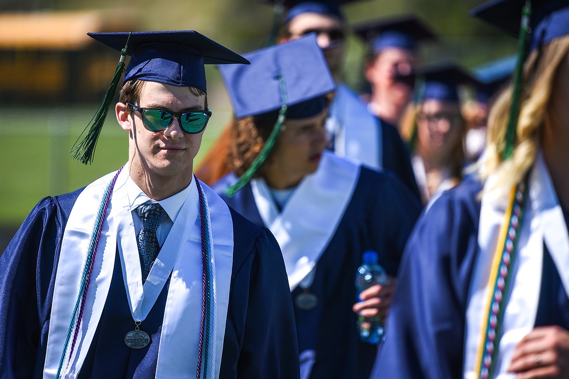 Graduates make their way to their seats during the Glacier High School Class of 2020 commencement ceremony at Legends Stadium on Saturday, May 30. (Casey Kreider/Daily Inter Lake)