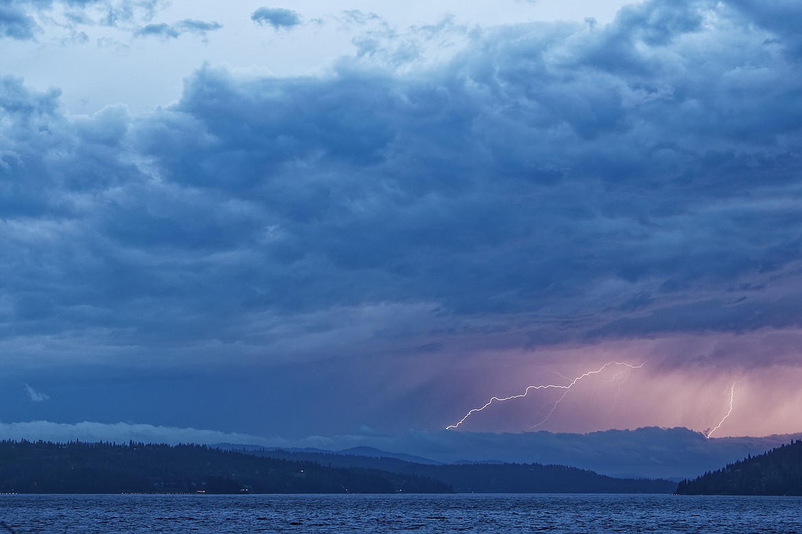 JAMES FILLMORE/Special to the Press
Some lightning was spotted over Lake Coeur d’Alene at 8:41 on Saturday night as storms rolled through the area from the southern part of the state.