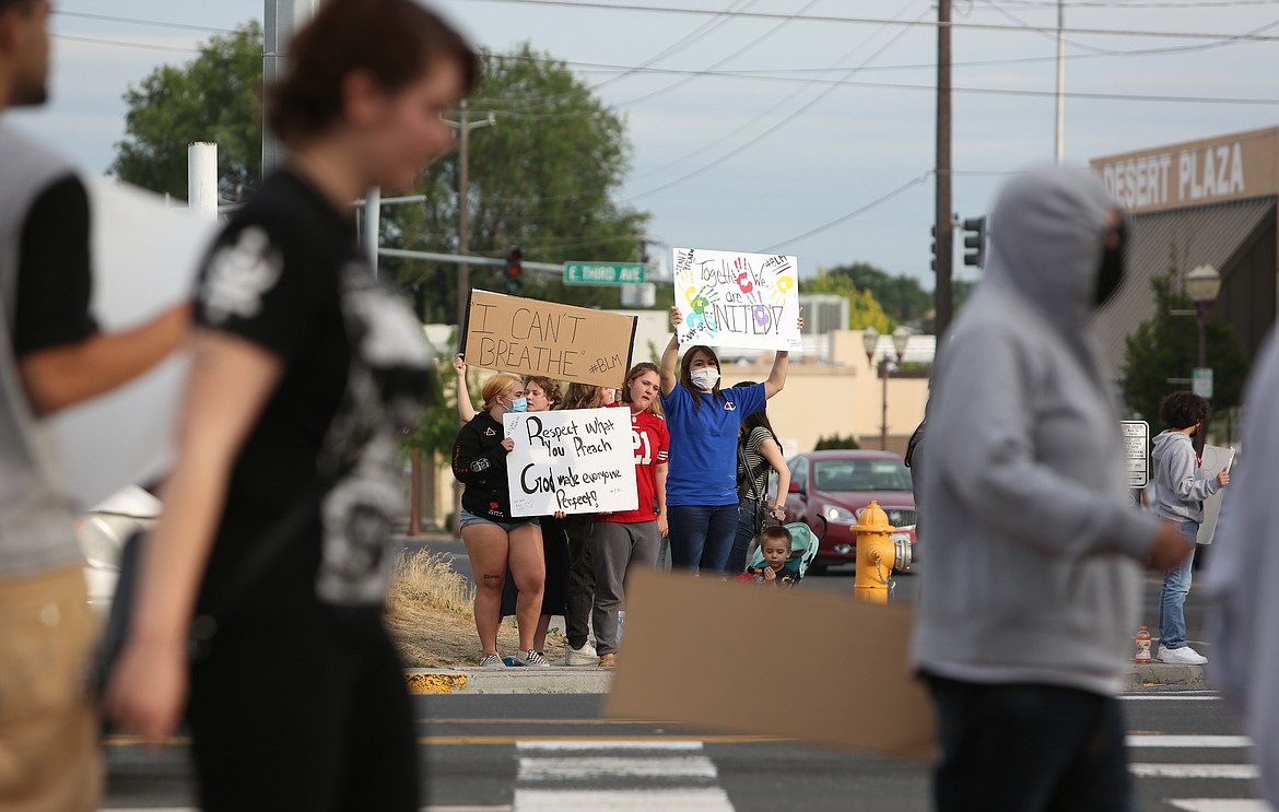 Connor Vanderweyst/Columbia Basin Herald
At least 30 people gathered in Moses Lake on Tuesday to protest racial injustice.