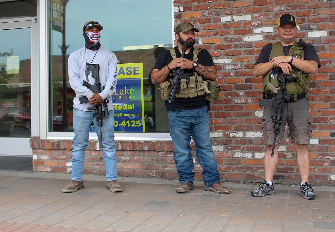 Casey McCarthy/Columbia Basin Herald
Community members gathered outside downtown Moses Lake storefronts hoping to deter any possible looting or violence that might take place during Tuesday’s protest.