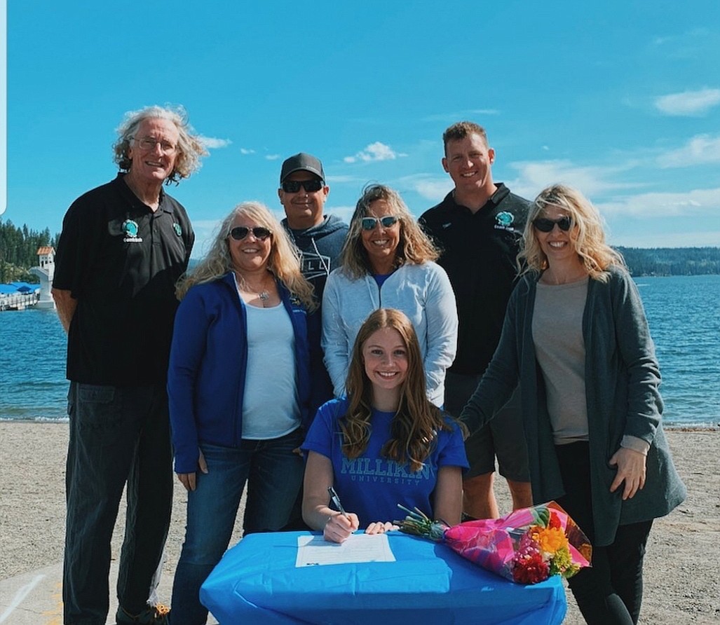 Coeur d’Alene High senior Taylen Zahnow recently signed a letter of intent to swim at NCAA Division III Millikin University in Decatur, Ill. Seated is Taylen Zahnow; second row from left are Melissa Zahnow (stepmother), Laura Curtis (Coeur d’Alene High head swimming coach) and Jen Zahnow (mother); and back row from left, Bob Wood (Coeur d’Alene Area Swim Team coach), Lee Zahnow (father) and Jade Sobeck (Coeur d’Alene Area Swim Team coach).