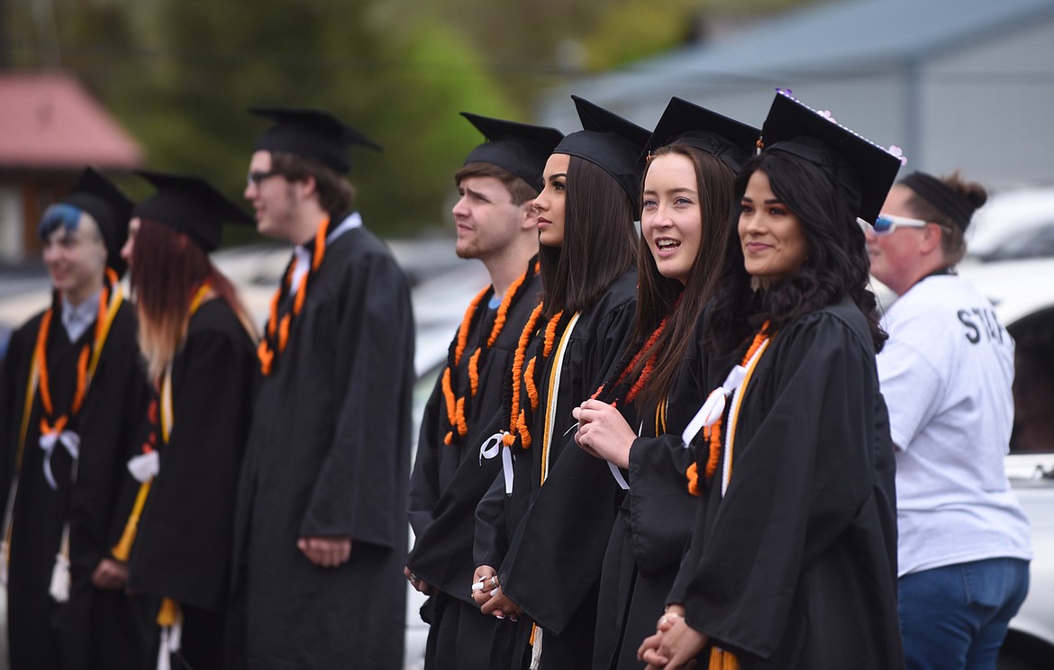 PLAINS GRADUATES prepare to receive their diplomas Sunday, May 24 at the high school. (Scott Shindledecker/Valley Press)