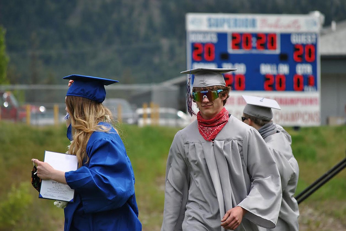 With a bright future ahead, Superior senior Hewston Coon dons sunglasses in the graduation processional. (Amy Quinlivan/Mineral Independent)