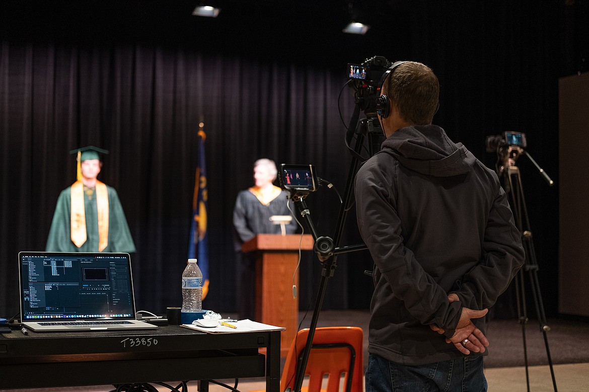 Jake Cooke directs a student during the filming of the 2020 graduation video. (Daniel McKay/Whitefish Pilot)