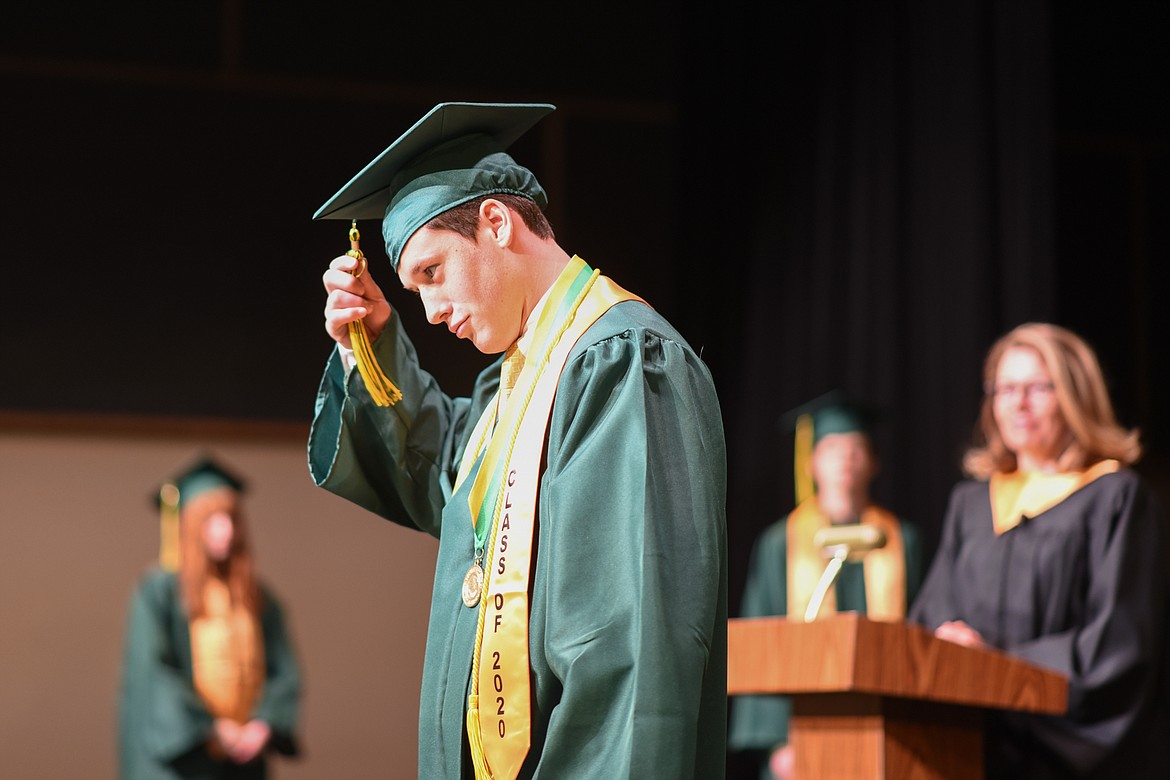 Grant Kahle moves his tassel during the filming of the 2020 graduation video. (Daniel McKay/Whitefish Pilot)