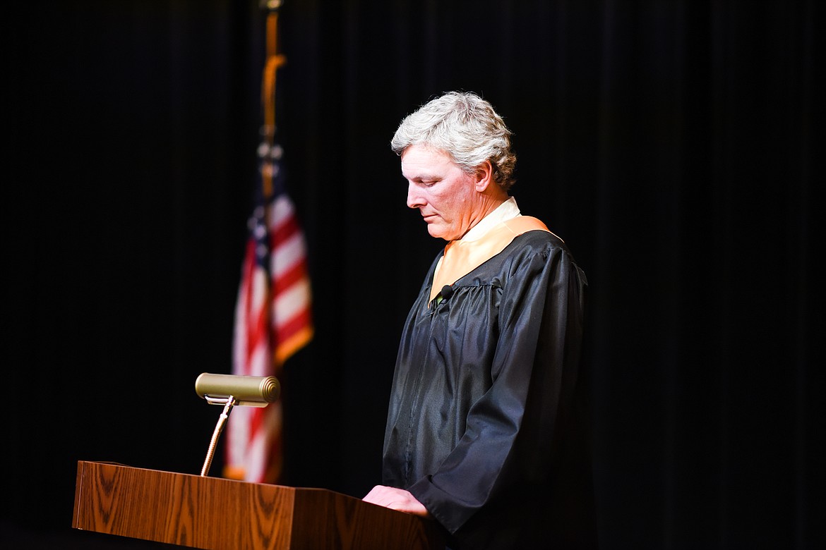 Whitefish High School teacher Chris Schwaderer reads students' names during the filming of the 2020 graduation video. (Daniel McKay/Whitefish Pilot)