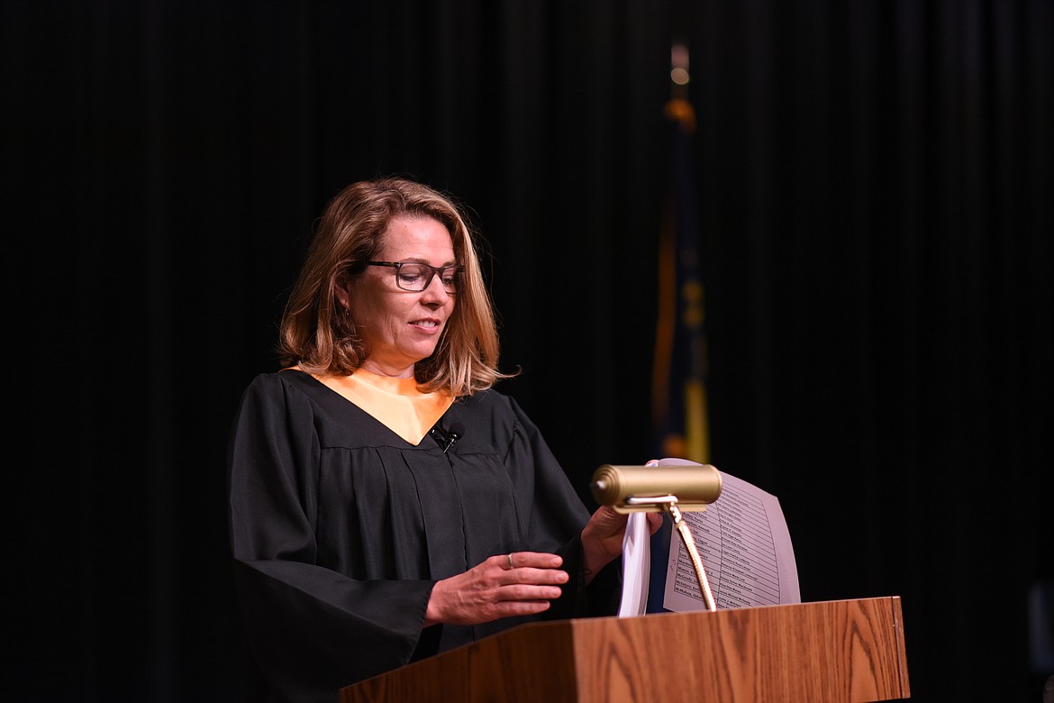 Whitefish High School teacher Jacqueline Gaertner reads students' names during the filming of the 2020 graduation video. (Daniel McKay/Whitefish Pilot)