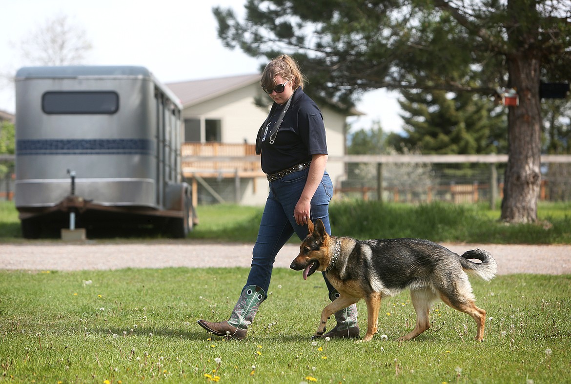 Amanda Rehmer of Lorenzo’s Dog Training Team: Montana works with her 1  -year-old German Shepherd, Hylia, outside her Kalispell home on May 25. (Mackenzie Reiss/Daily Inter Lake)