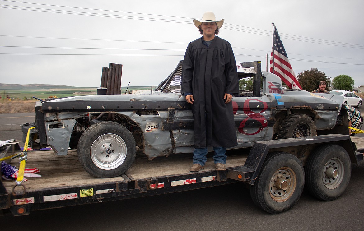 A Royal High School graduating senior brought his demolition derby car for the graduation parade on Friday evening.