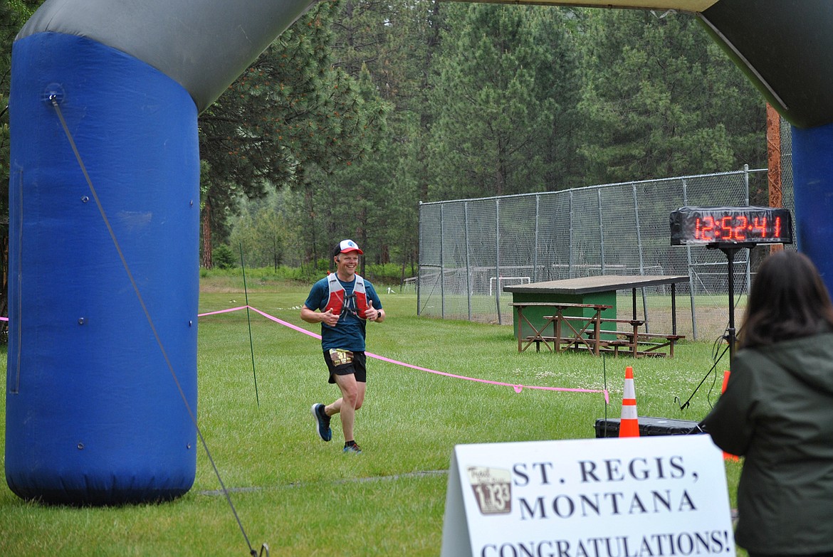 Shaun Kendall from Missoula is all smiles as he completes his first 50K race during the Trail Rail Run on Saturday, June 6. (Amy Quinlivan/Mineral Independent)