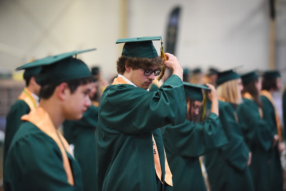 Justin Conklin moves his tassel over during Saturday's Whitefish High School Graduation. (Daniel McKay/Whitefish Pilot)