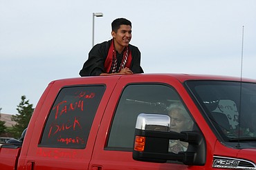 Cheryl Schweizer/Columbia Basin Herald 
 The Wahluke High School class of 2020 celebrated graduation in a unique fashion, with a car parade through Mattawa and extra precautions when they picked up their diplomas.