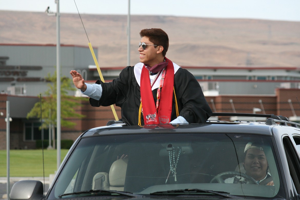 The Wahluke High School class of 2020 celebrated graduation in a unique fashion, with a car parade through Mattawa and extra precautions when they picked up their diplomas.