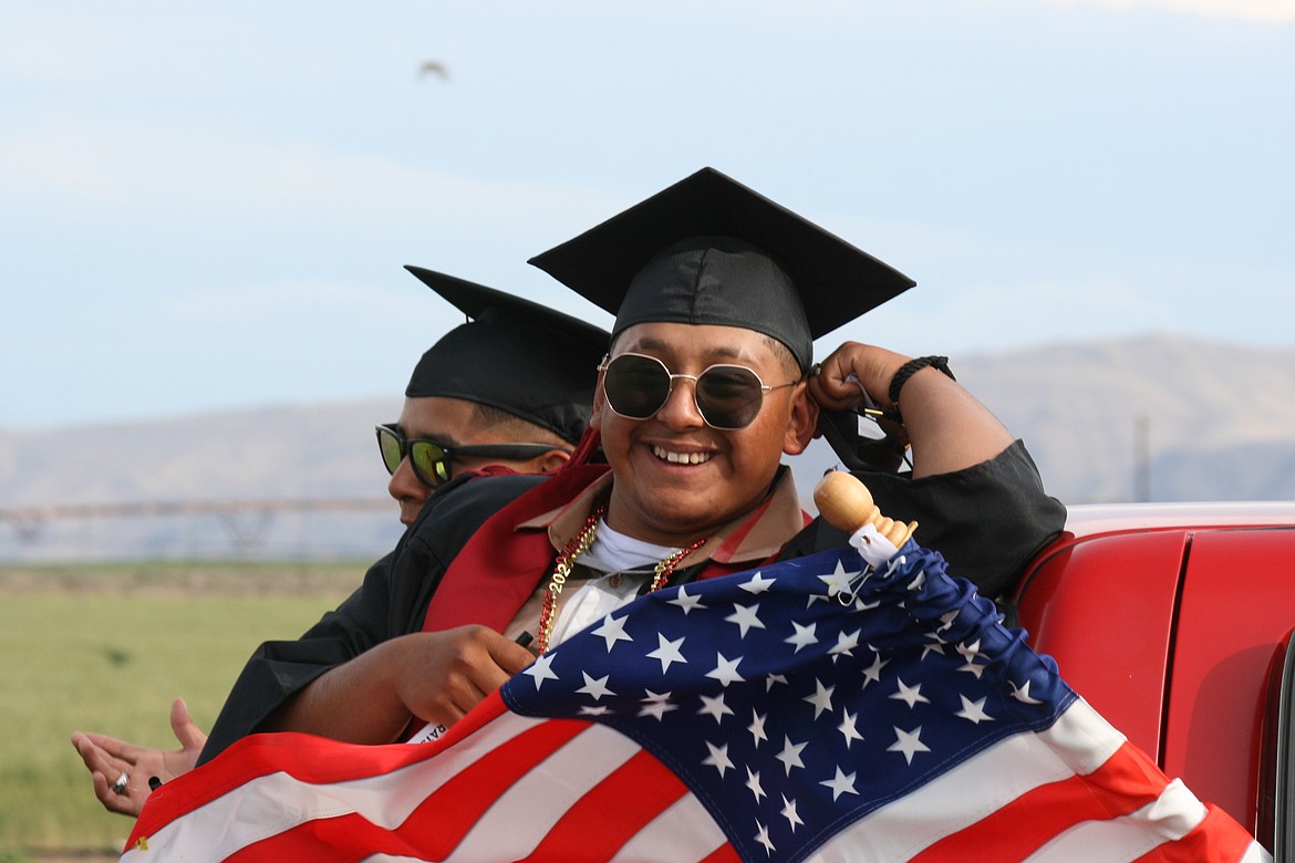 Cheryl Schweizer/Columbia Basin Herald 
 The Wahluke High School class of 2020 celebrated graduation in a unique fashion, with a car parade through Mattawa and extra precautions when they picked up their diplomas.