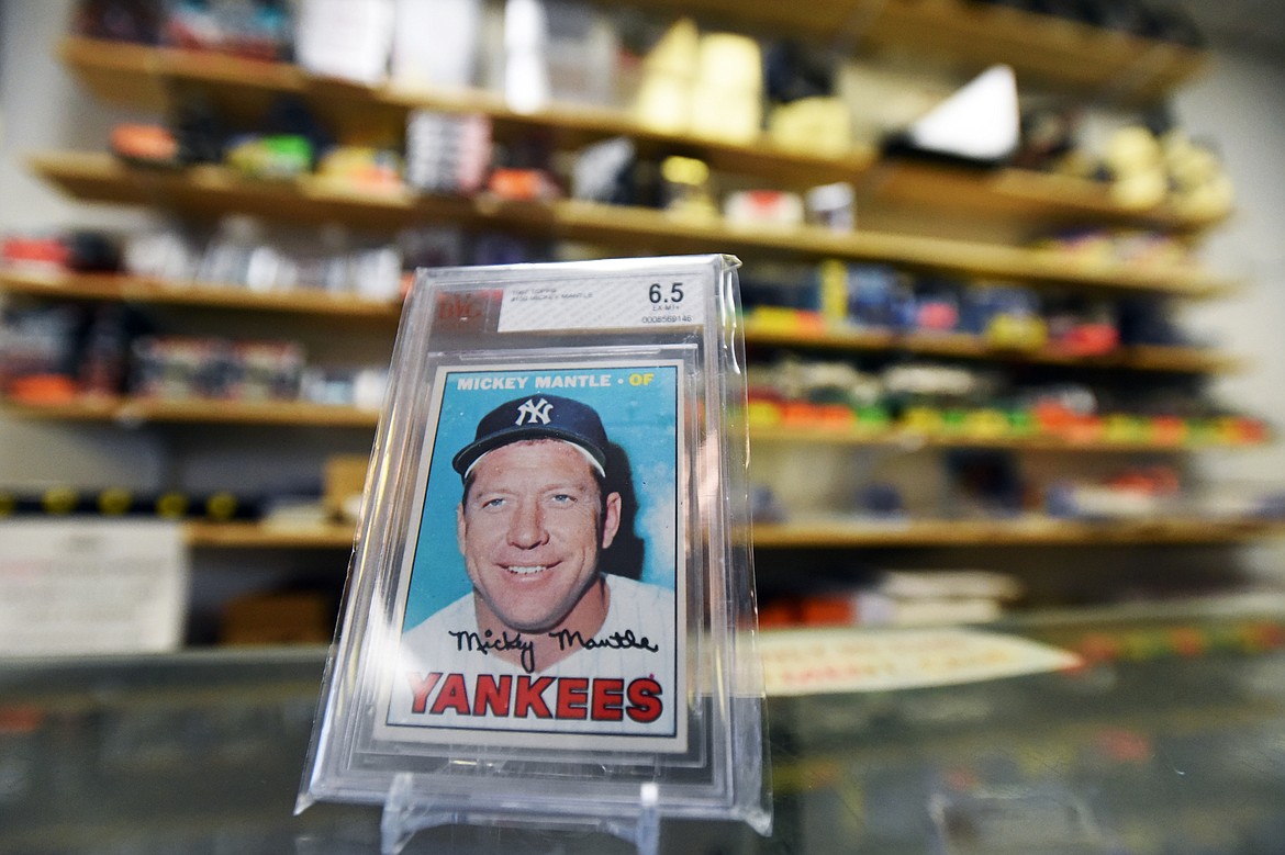 A Topps 1967 Mickey Mantle card for sale at Sports Cards Plus in Evergreen.