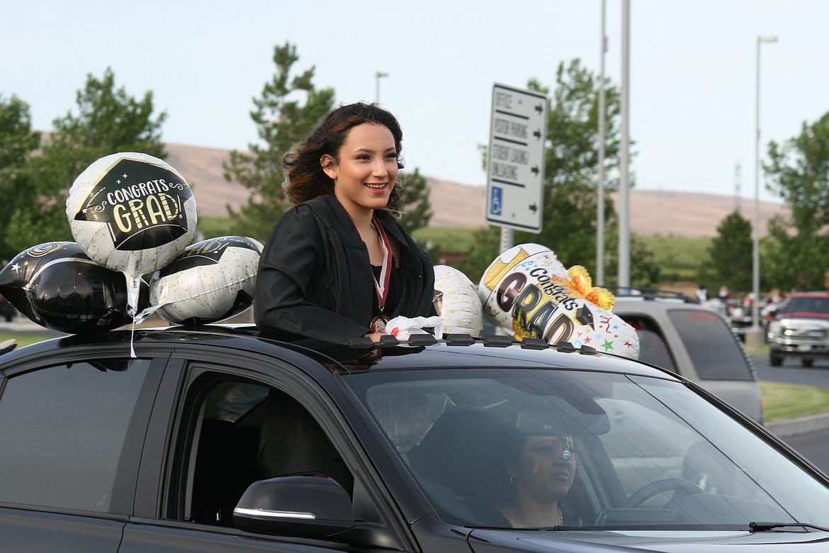 Cheryl Schweizer/Columbia Basin Herald 
 Wahluke HIgh School seniors got a car parade around town as part of a very non traditional graduation 2020.