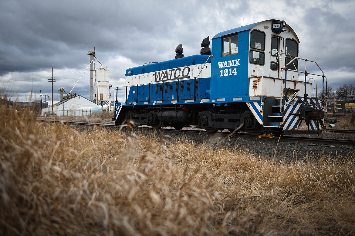 A train engine donated to the city of Kalispell by Mission Mountain Railroad sits along a span of track above Woodland Park that will be developed into the Kalispell Trail on Saturday, March 28.