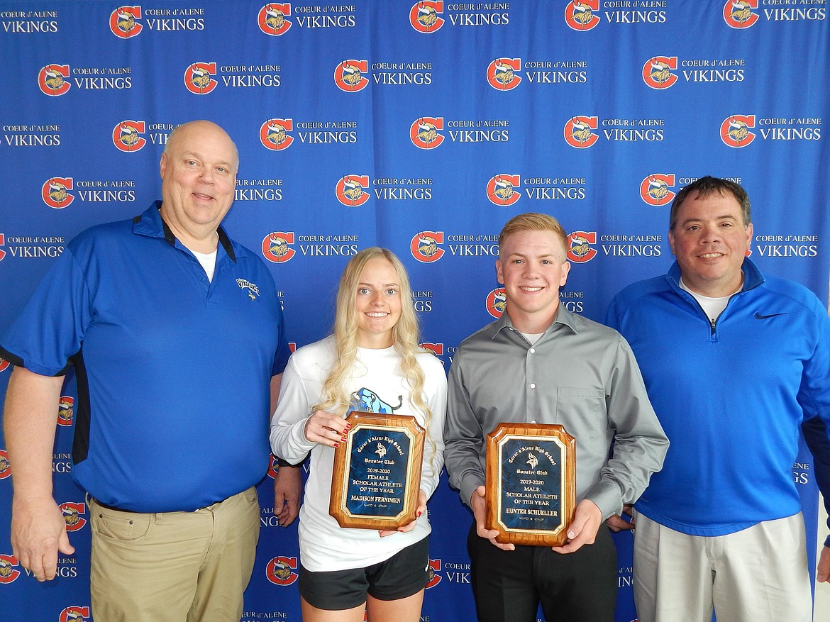 Maddie Fernimen, second from left, and Hunter Schueller were recently named Coeur d’Alene High Viking Booster Club Female and Male Scholar-Athletes of the Year, respectively. At left is Rick Rasmussen, booster club president; and at right is Mike Bloom, booster club treasurer.