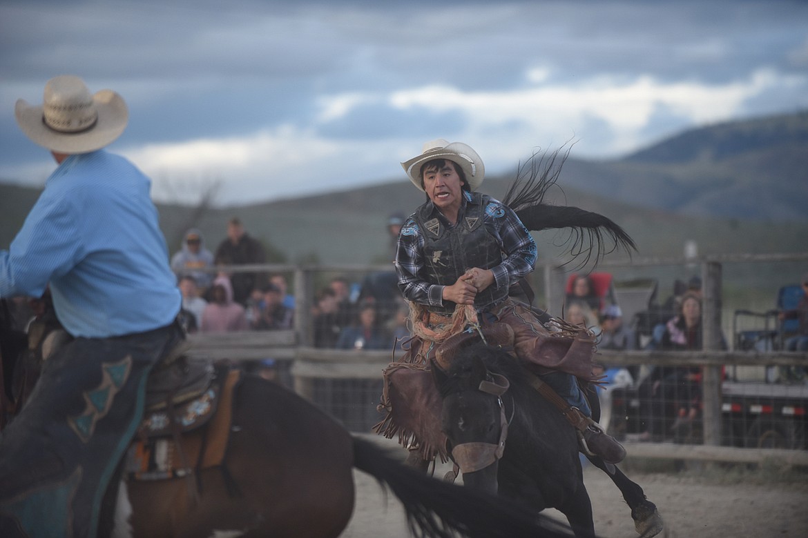 Shane Bird Rattler competes in the saddle bronc event during the mens breakaway at the Hot Springs Rodeo June 13. (Scott Shindledecker/Valley Press)