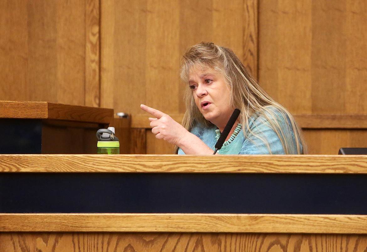 $ID/NormalParagraphStyle:Victim Peggy Hedden testifies at the sentencing hearing for Samantha Lee Starks. Hedden said she wanted Starks to do time for her crime  of robbery, but also hoped that Starks would “come out better” after serving her sentence.