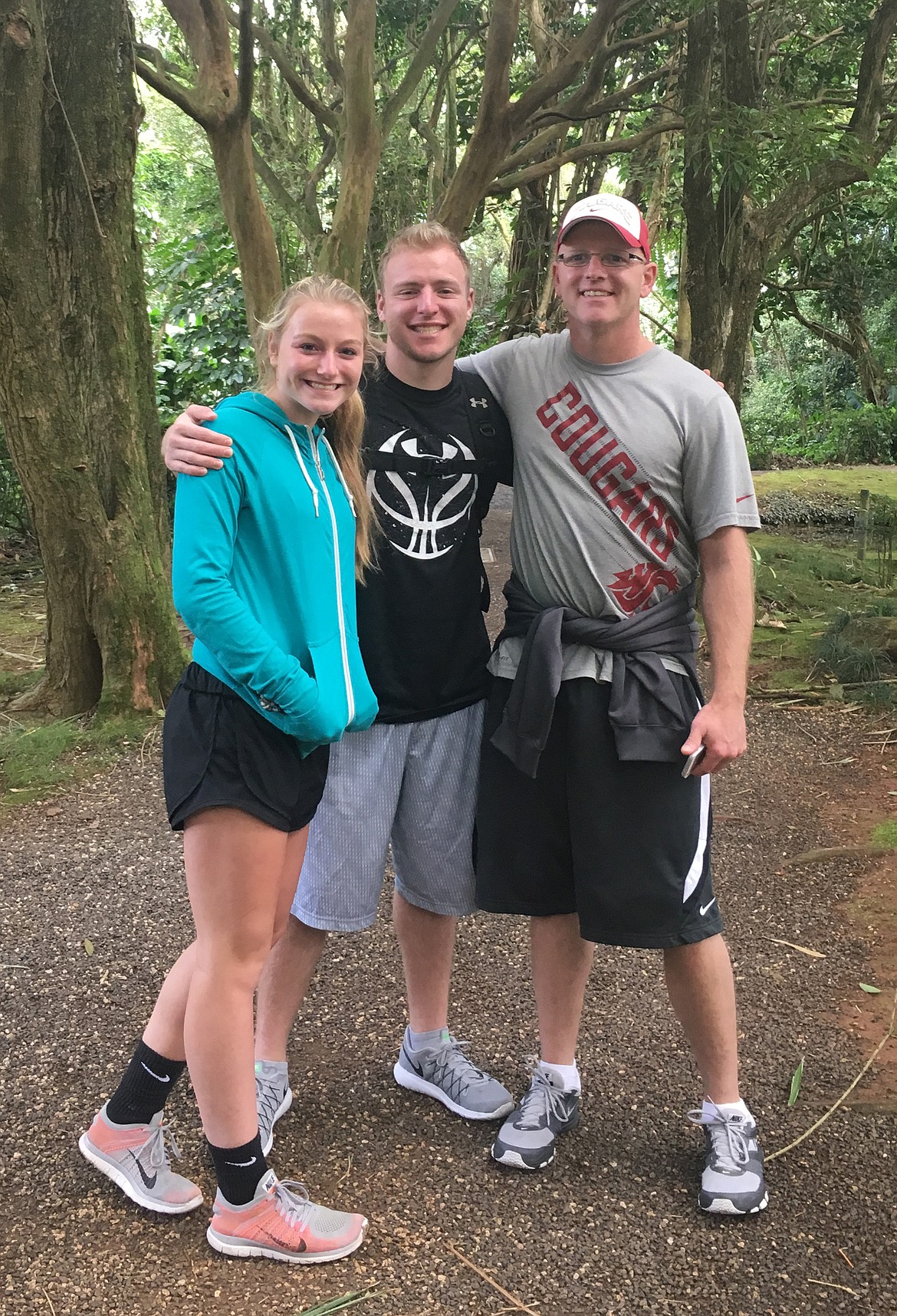 Matt Krogh, right, poses with his daughter Madison and son Collin.