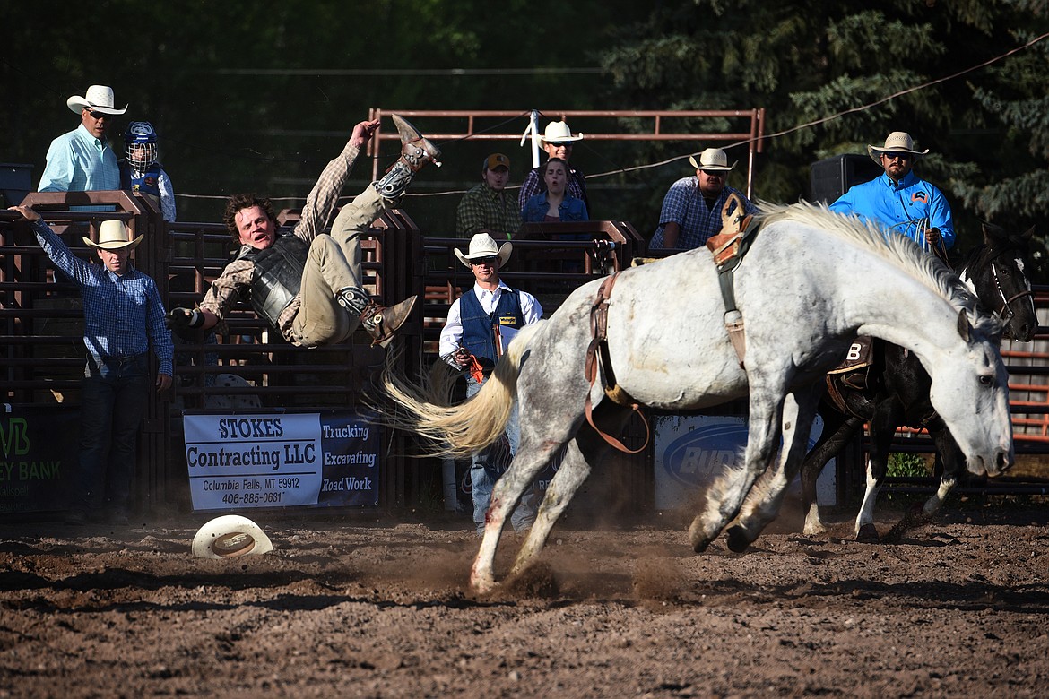 Will Swayze goes flying during the bareback bronc riding portion of the Brash Rodeo Summer Series. (Jeremy Weber/Daily Inter Lake)