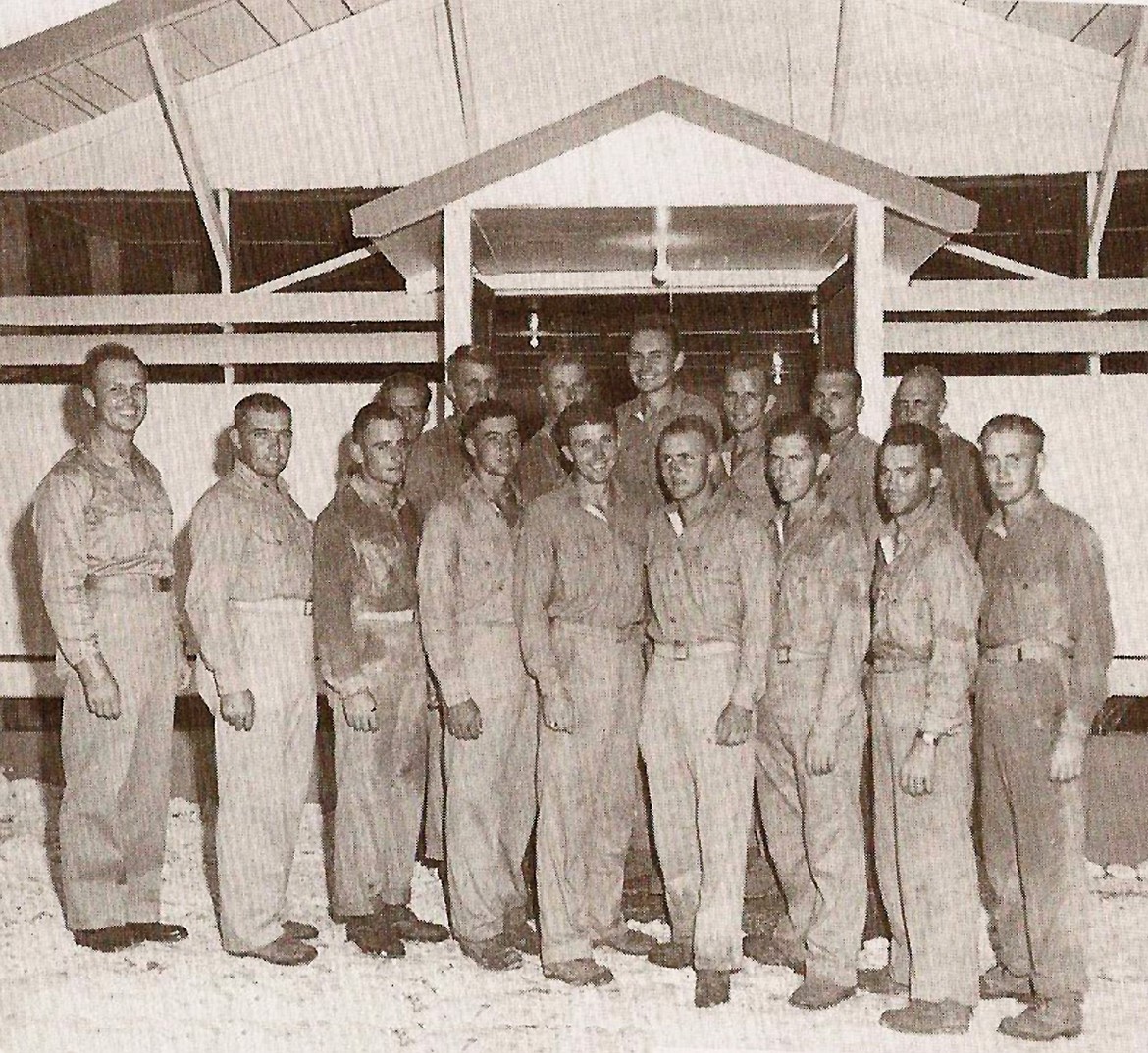 Robert Hammond, third from left, and his comrades in front of the chapel they rebuilt in Saipan. He used to jokingly say that his shirt was the dirtiest because he worked the hardest, according to his daughter-in-law Sylvia Hammond.