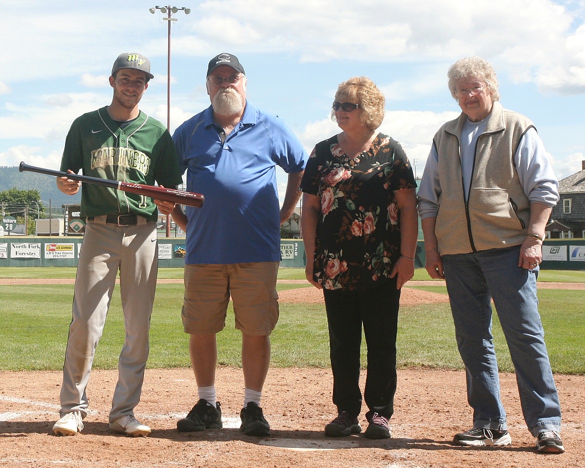 Keyan Dalbey left, Kelly MacDonald, Julie MacDonald and Sandy Nelson. Keyan Dalby was awarded the Boyd Nelson Memorial MVP. Keyan hit .418 on the weekend, drove in 8 runs, and had a 2-run double in the chipper to put the game away. (Paul Sievers/The Western News)