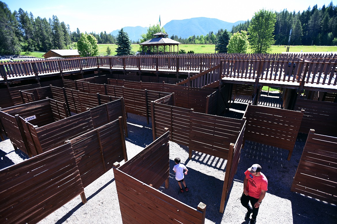 Visitors navigate the Glacier Maze which features 1   miles of passages and overhead walkways, at the Amazing Fun Center in Coram.