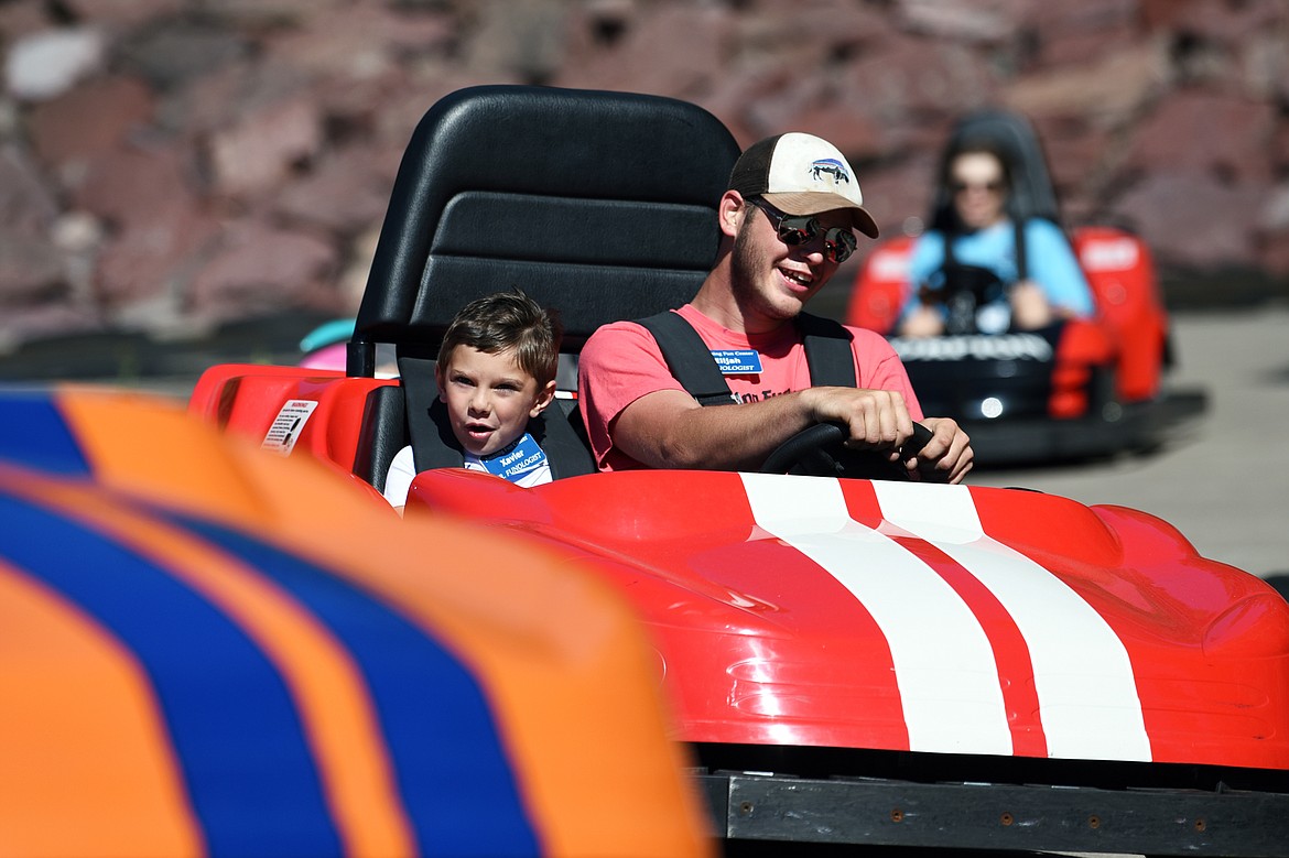 Visitors race on the go-kart track at Amazing Fun Center in Coram on Tuesday, June 23. (Casey Kreider/Daily Inter Lake)