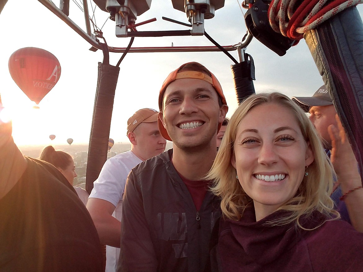 A hot air balloon ride in Lithuania helped Sarah Weaver conquer her fear of heights. She’s pictured with her husband.