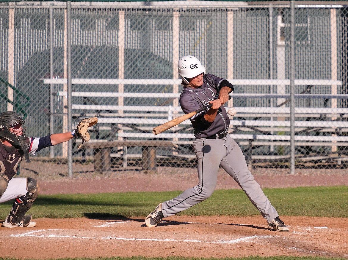 Zach Veneman connects on a pitch during Thursday’s win over the Billings Expos AA in the first game of the Ed Gallo wood bat tournament in Whitefish. (Daniel McKay/Whitefish Pilot)