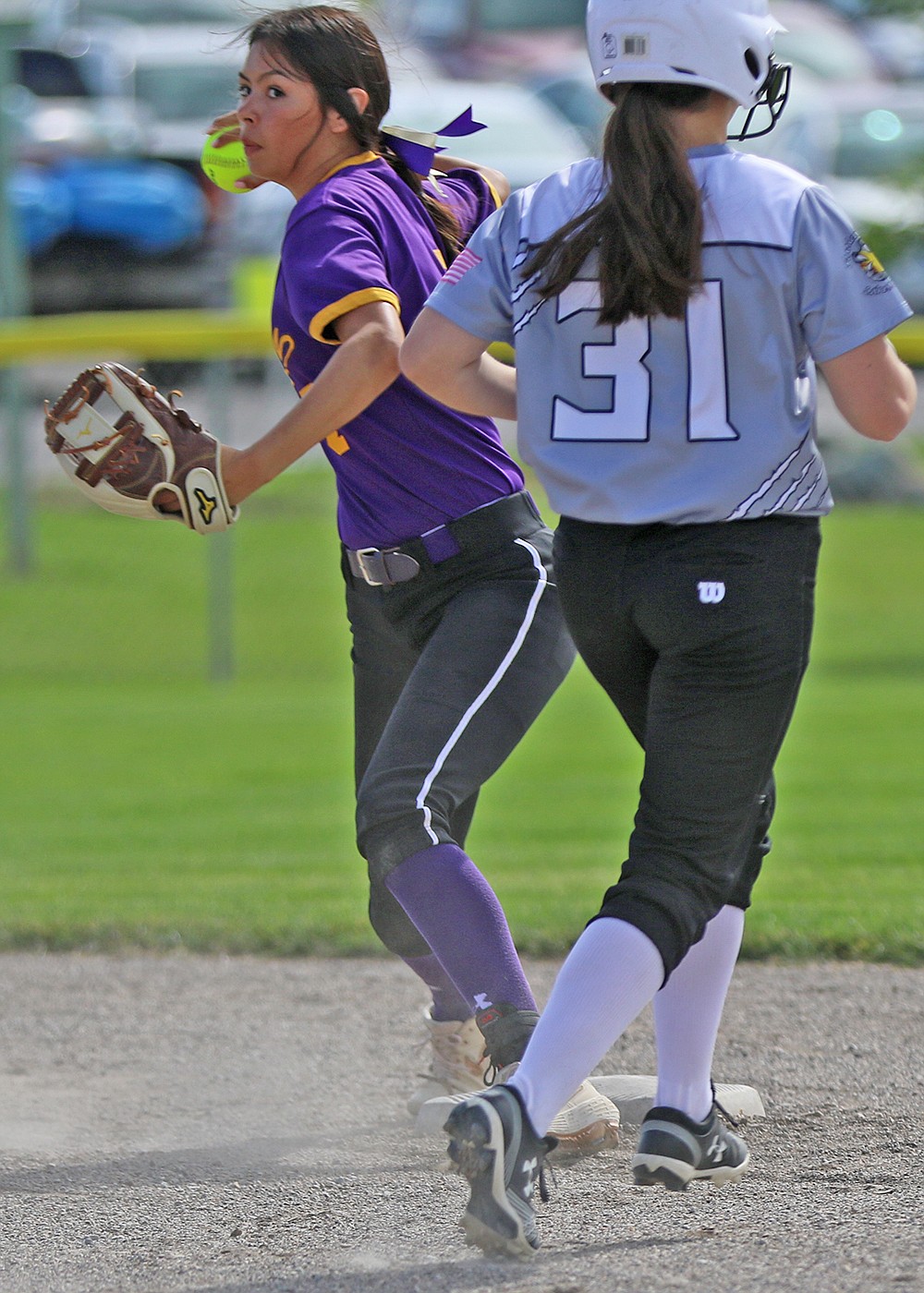 16U Polson Lady Pirate Josie Caye makes a double play during a game at the 2020 Emeralds Smash softball tournament in Kalispell June 26-28. (Bob Gunderson photo)