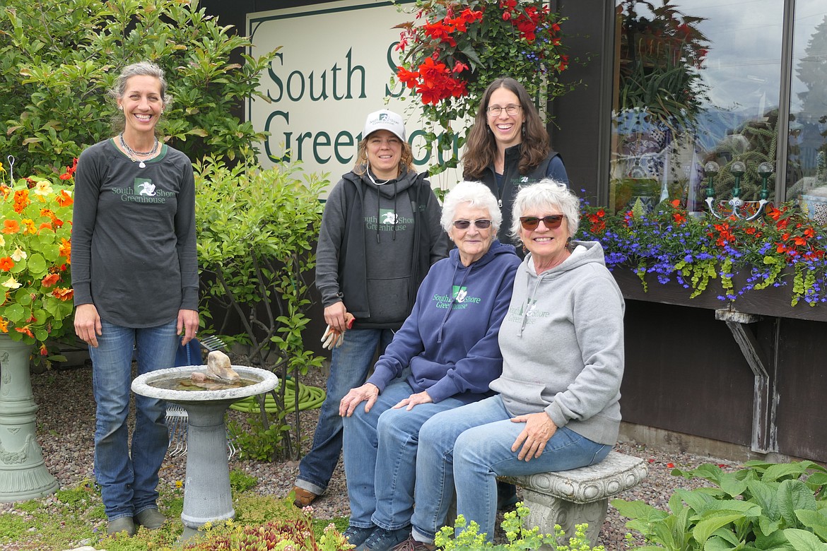 AFTER 42 years in the family, three generations of Shores and crew will be saying goodbye to South Shore Greenhouse at the end of this season. Seated are Kathy Shore (r) and her mother, Lois. Standing: Kari Wise (Kathy’s daughter) (l), Abby Feiler, Jami Williamson. (Carolyn Hidy/Lake County Leader)