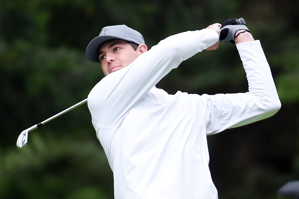 Art Doorn watches his approach shot from the 9th fairway during the Earl Hunt 4th of July Tournament at Whitefish Lake Golf Club on Thursday, July 2. (Casey Kreider/Daily Inter Lake)