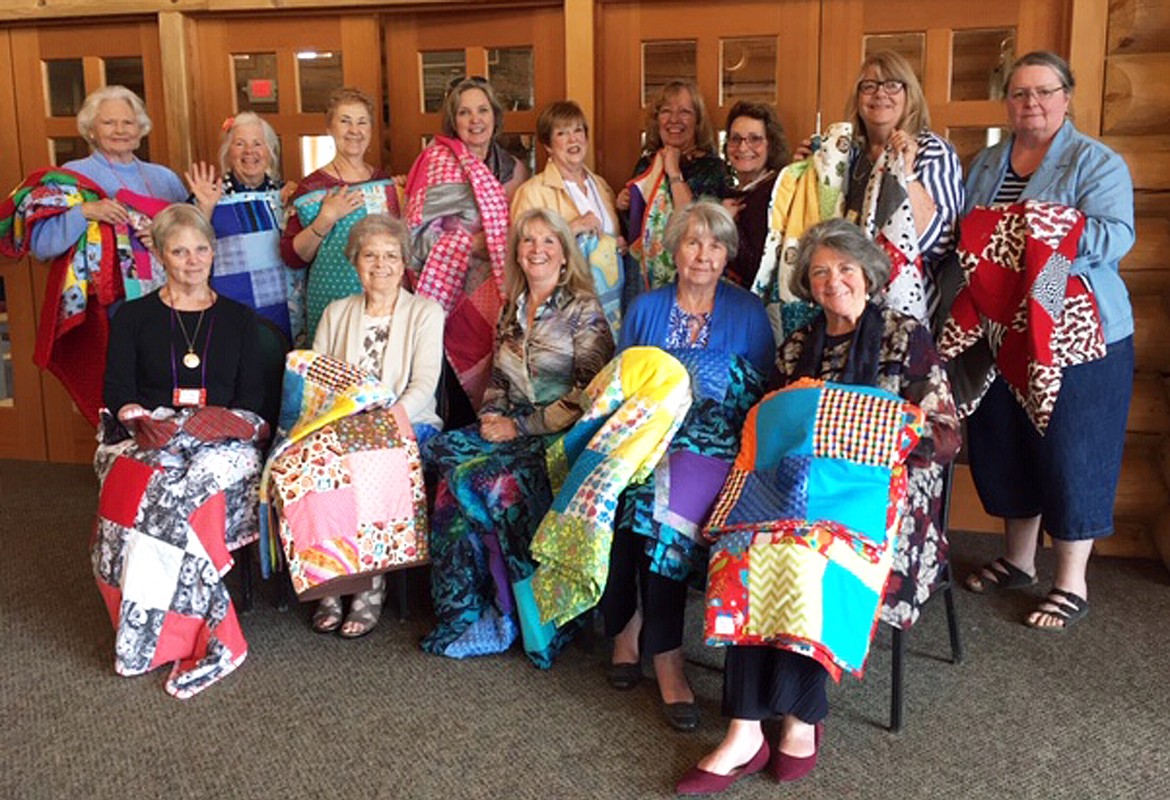 The Women of Rollins met June 9 for their annual luncheon at the Glacier Camp on Flathead Lake. On display were the 20 quilts made by members for the Children’s Oncology Department at Kalispell Regional Medical Center. This is the fourth year the club has made quilts for children with cancer. (Provided photo)