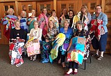 Women of Rollins donate quilts to comfort kids with cancer