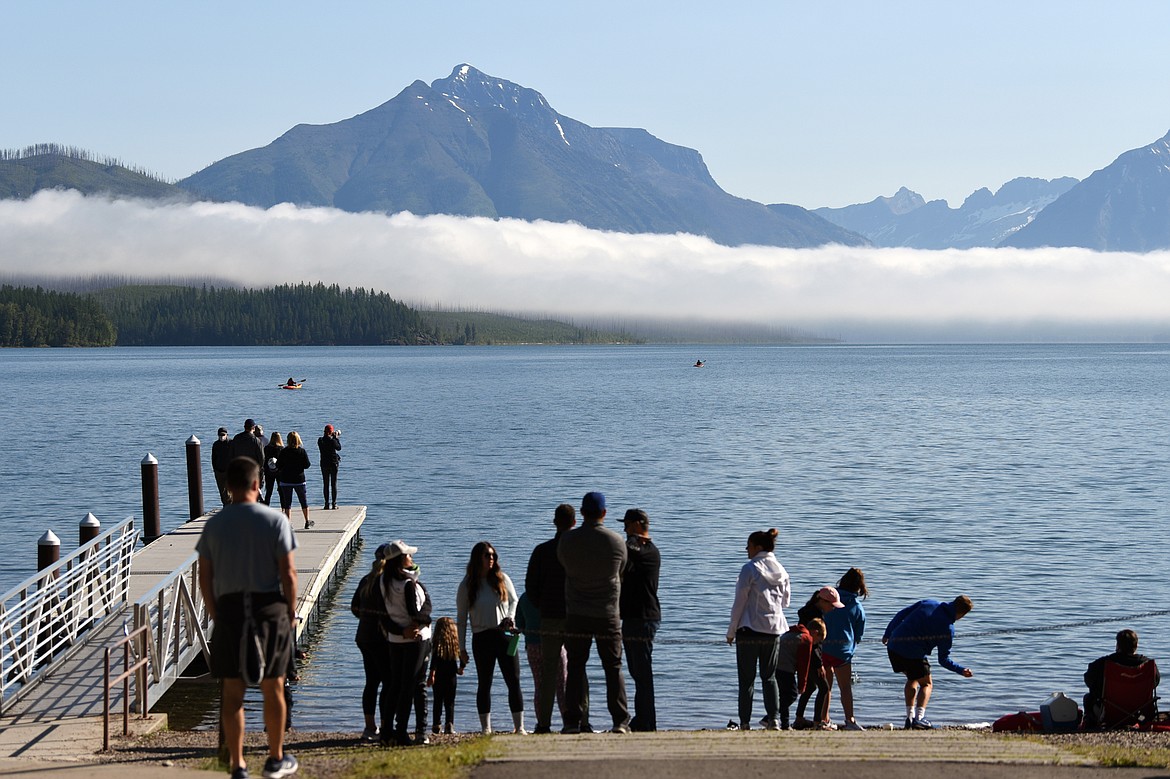 Visitors explore the area around the boat dock on Lake McDonald in Glacier National Park’s Apgar Village on Friday, July 3. Due to traffic congestion and limited parking availability, access to the park’s Going-to-the-Sun Road was temporarily restricted at Lake McDonald Lodge at 8:07 a.m. and at the foot of Lake McDonald at 8:51 a.m. Friday, according to the park’s Twitter account. (Casey Kreider/Daily Inter Lake)